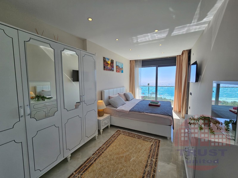 Seafront apartment for sale in Mahmutlar. Luxurious living just 10 meters from the sea!