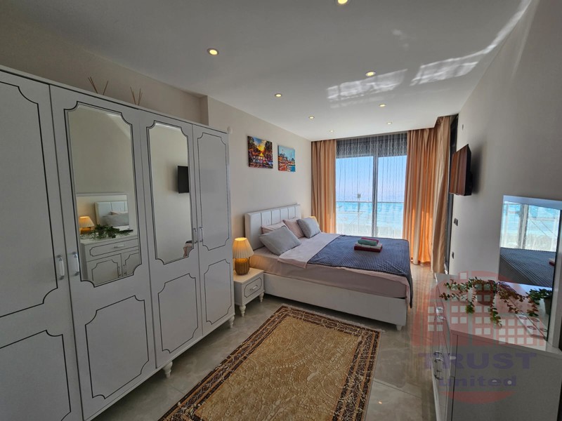 Seafront apartment for sale in Mahmutlar. Luxurious living just 10 meters from the sea!