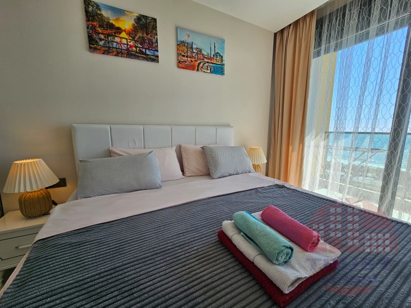 Seafront apartment for sale in Mahmutlar. Luxurious living just 10 meters from the sea!
